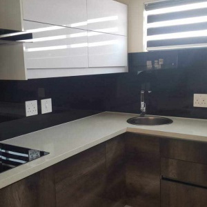 Black and white gloss splashback